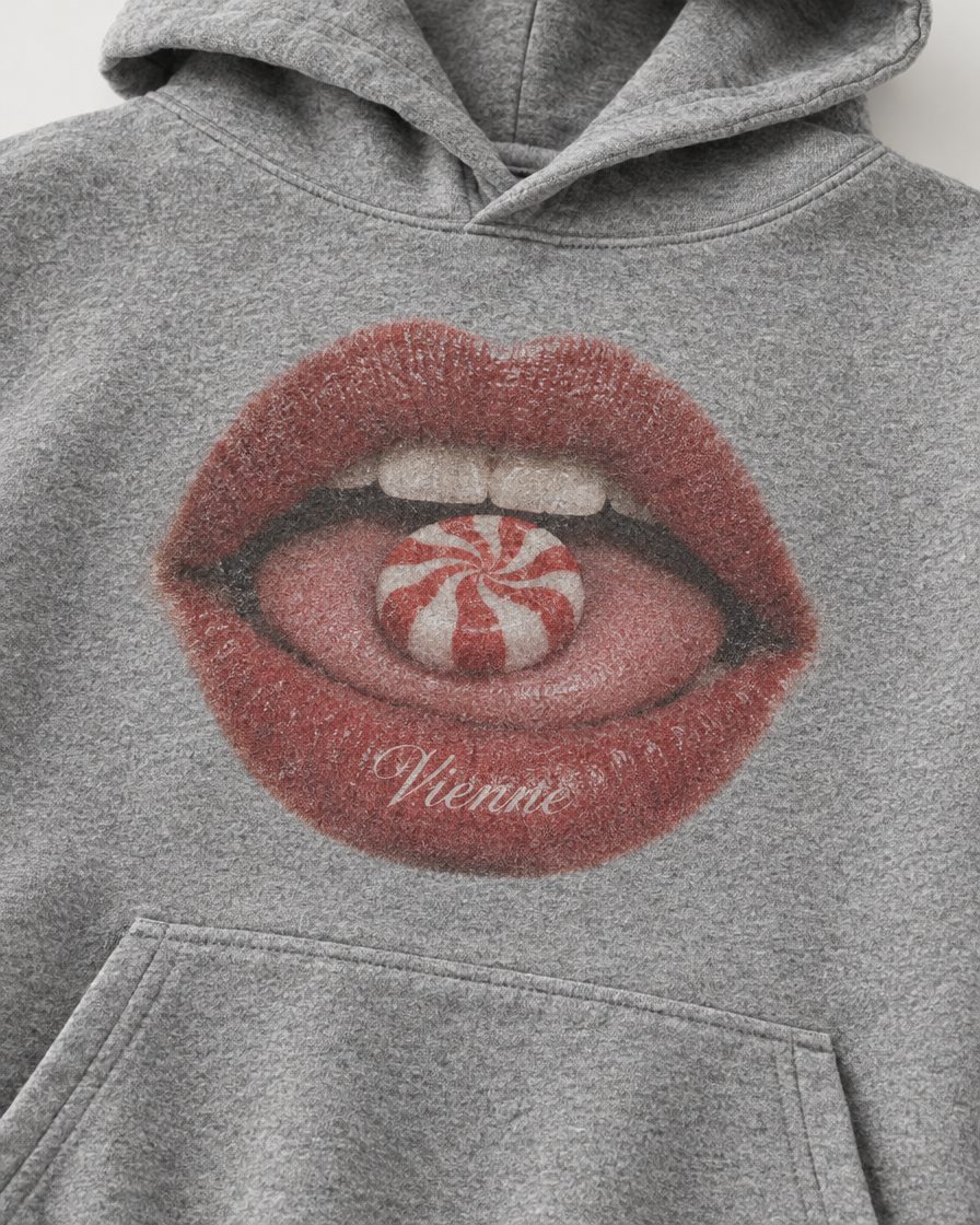 Concept image: close up of the lips and peppermint print on the Bonbon Hoodie