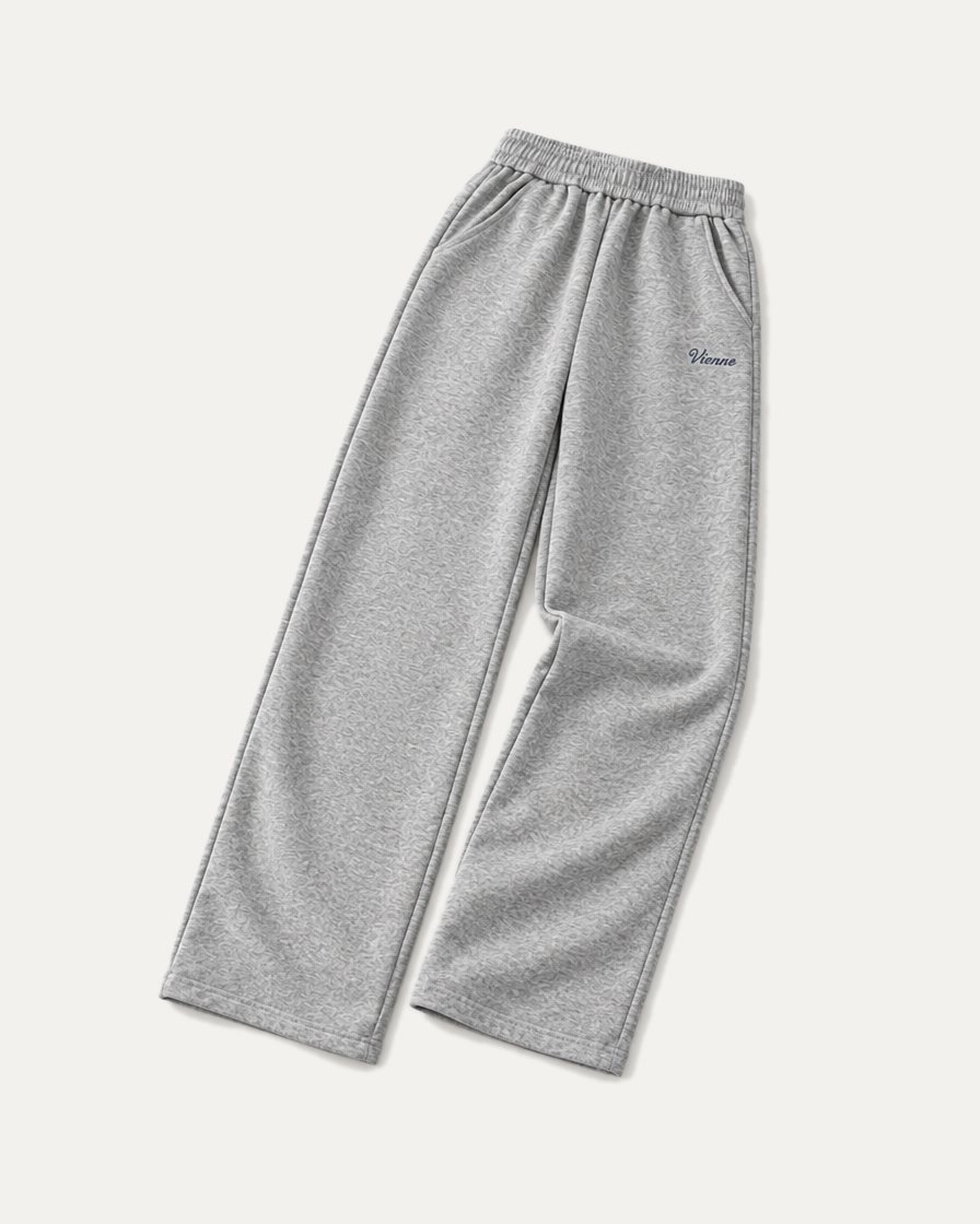 Concept image: heather grey Bonbon Sweatpant laid at an angle, wide straight leg